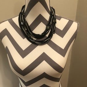 Multi strand black beaded necklace